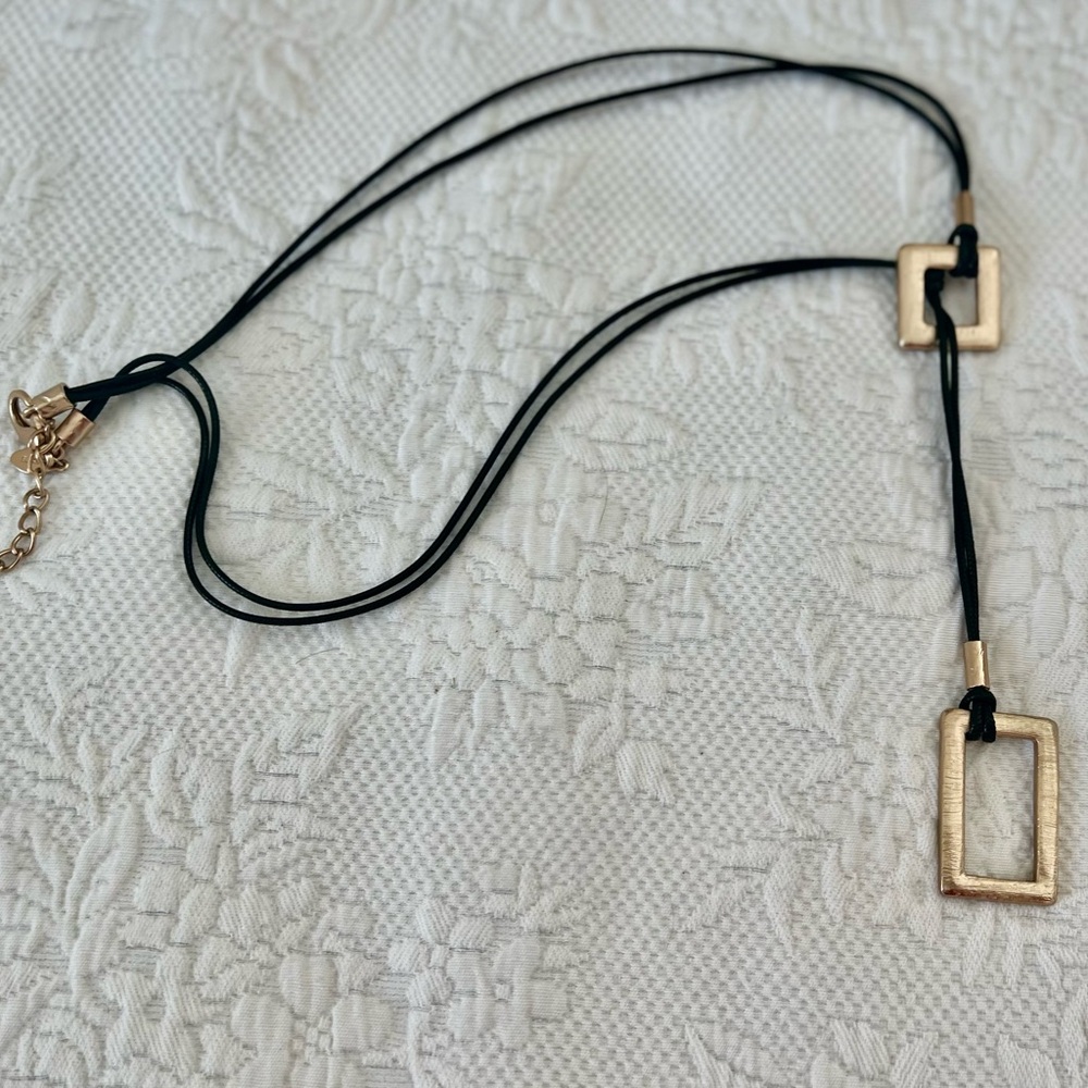 Chicos necklace. Black with brushed gold accents.